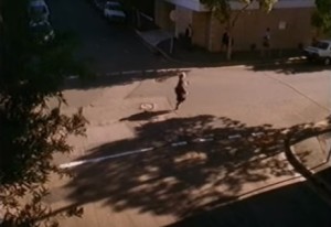 Jan running down the street because she knows her boss is not happy