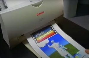 A Canon pinter that prints a colourful picture.