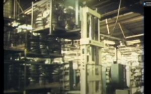 A crown forklift lifting a heavy stuff.