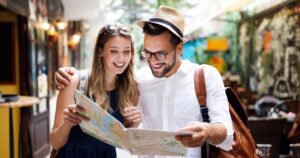 Traveling and Marketing Banner Image - Travel. Tourist couple traveling, Walking on street. Portrait of beautiful young people