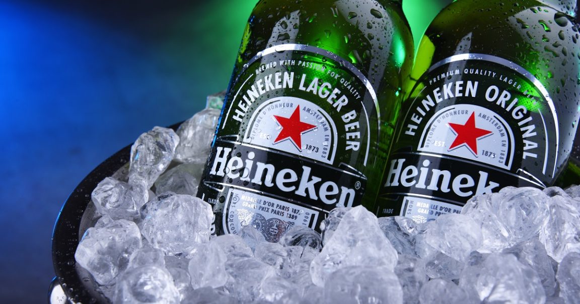 Bottles of Heineken beer in bucket with crushed ice