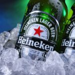 Bottles of Heineken beer in bucket with crushed ice