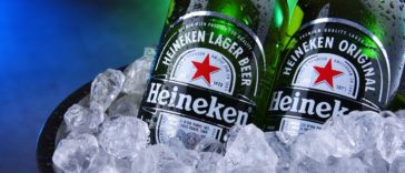 Bottles of Heineken beer in bucket with crushed ice