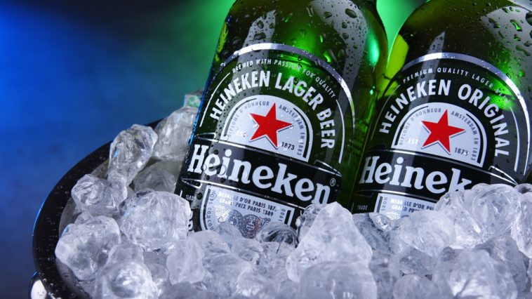 Bottles of Heineken beer in bucket with crushed ice