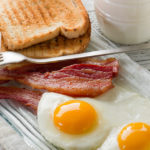 bacon eggs orange juice breakfast foods