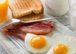 bacon eggs orange juice breakfast foods