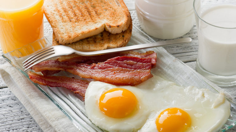bacon eggs orange juice breakfast foods