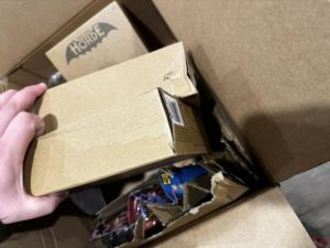 further damaged mailer boxes