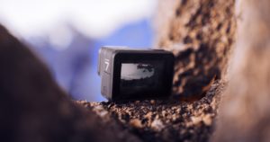 gopro camera sitting on rocks
