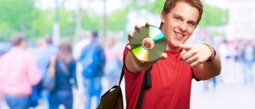 happy guy holding a cd