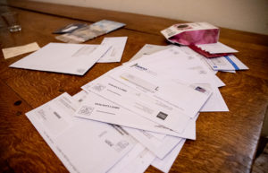 Envelope with blurred address, but visible mail barcode