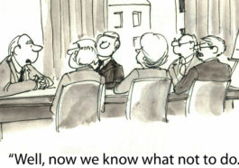 Cartoon with a board meeting and someone saying "Well, now we know what not to do"