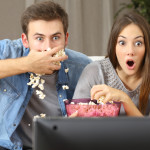 over acting couple watching tv