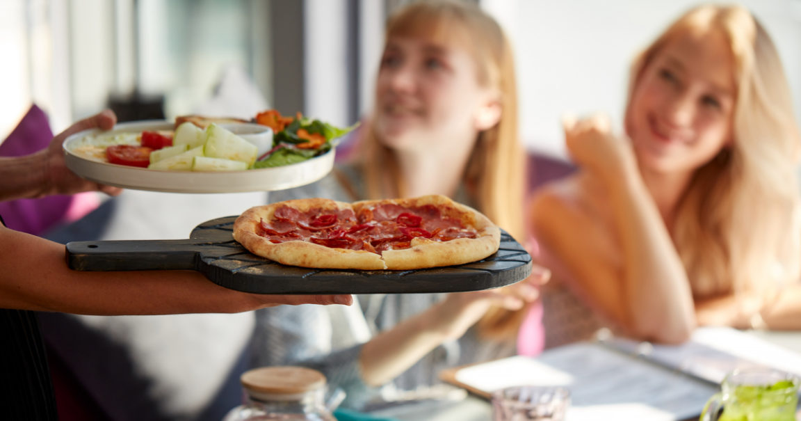 pizza being served