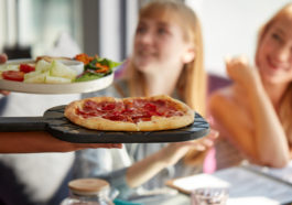 pizza being served