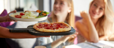 pizza being served