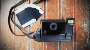 polaroid instant film razor and blades business model