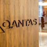 London, England - February 2019: Qantas sign carved into the wo