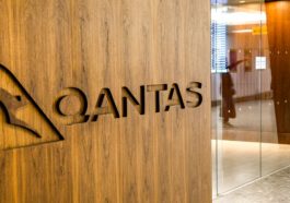 London, England - February 2019: Qantas sign carved into the wo