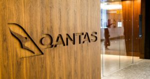 London, England - February 2019: Qantas sign carved into the wo