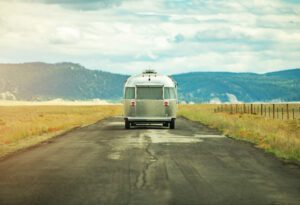 Summer Journey Across America in the Travel Trailer. Classic Recreational Vehicle Crossing Colorado Prairies