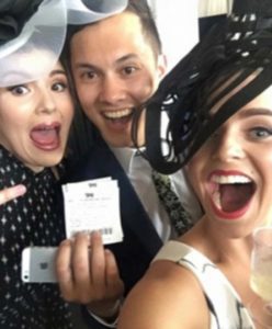 Sam with winning ticket