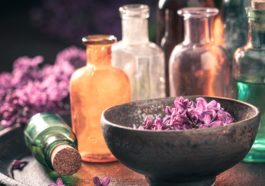 Special treatments with aromatic oils. Lilac aromatic oils. Homemade Products of flowers.