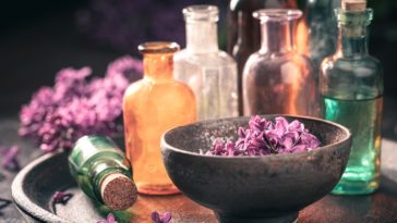 Special treatments with aromatic oils. Lilac aromatic oils. Homemade Products of flowers.
